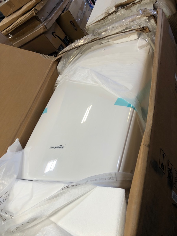 Photo 1 of Amazon Basics Portable Air Conditioner With Heat Pump, Cools 550 Square Feet, 13,000 BTU ASHARE / 10,000 BTU SACC, White 10,000 BTU Single Hose with Heat Pump