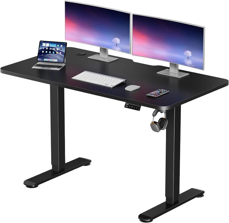 Photo 1 of WOKA Electric Standing Desk 48 x 24 Inch, Height Adjustable Stand Up Desk with Memory Controller, Sit Stand Desk with Splice Board, Adjustable Desks for Home Office, Motorized Standing Desk Black
