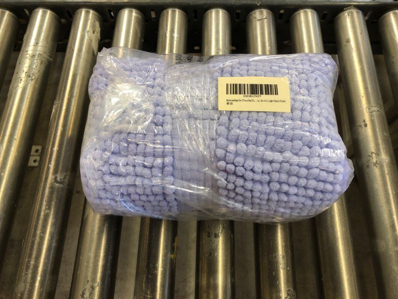 Photo 1 of 2 SETS OF PURPLE BATH RUGS 