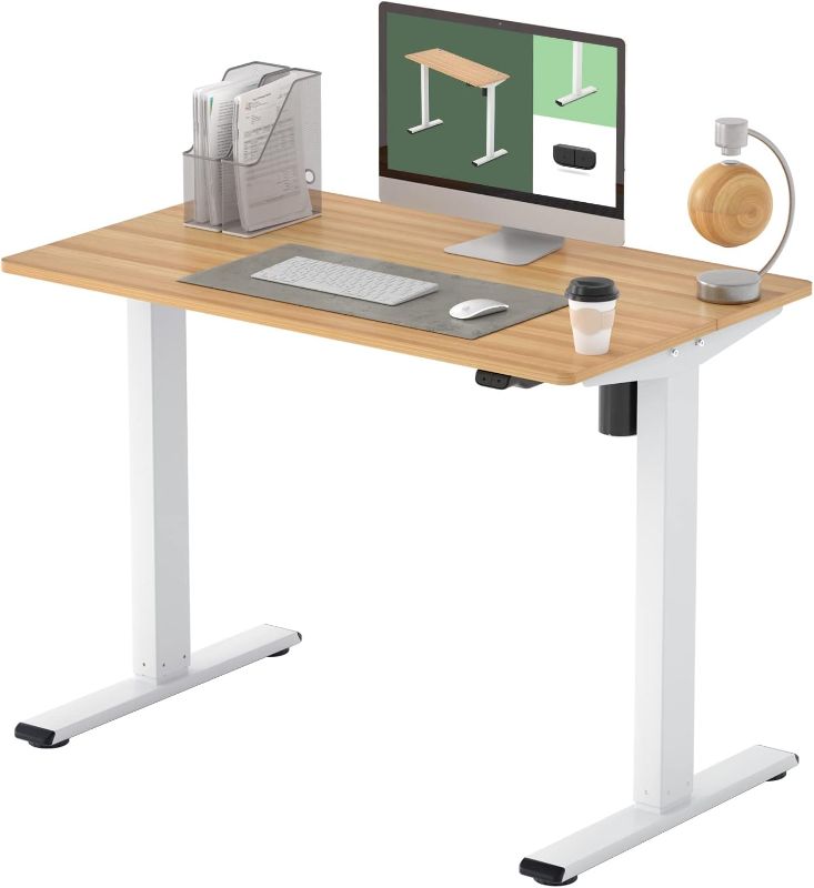 Photo 1 of FLEXISPOT Standing Desk Height Adjustable Desk Electric Sit Stand Up Desk with Whole Piece Desk Board Home Office Desks 40 x 24 Inches Vici (White Frame + Maple Top)
