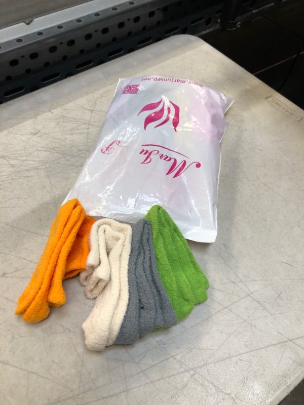 Photo 1 of MULTI COLOR FUZZY SOCKS FOR KIDS ( 4-6YRS) 