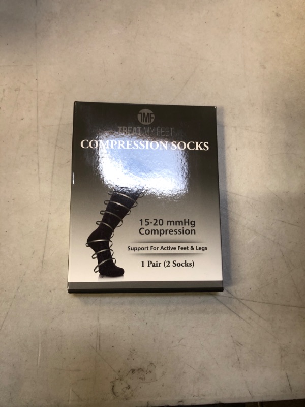 Photo 1 of COMPRESSION SOCKS 1 PAIR SIZE M 