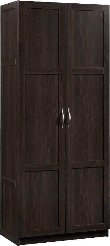 Photo 1 of Sauder 419496 Miscellaneous Storage Storage Cabinet, 29.61 " x D: 16.02 " x H: 71.50", Cinnamon Cherry finish
