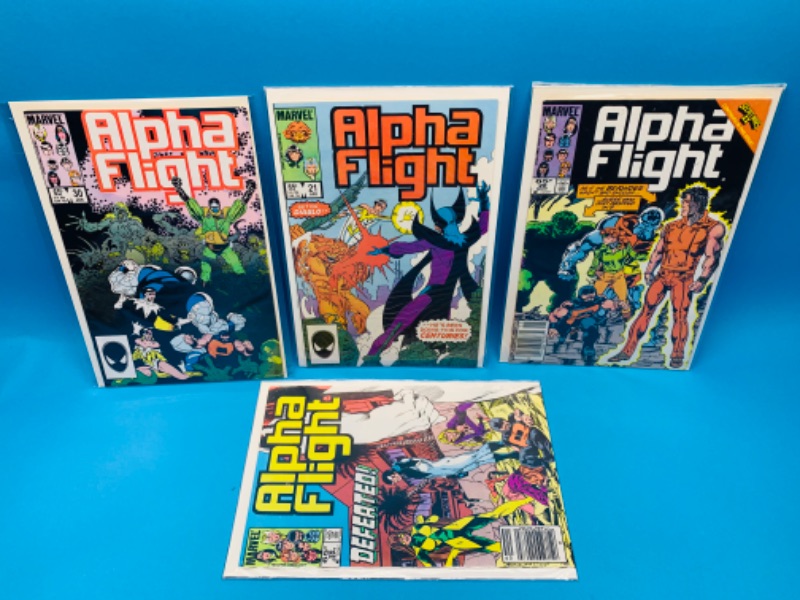 Photo 1 of 625025…3 vintage $.65 alpha flight comics in plastic sleeves 