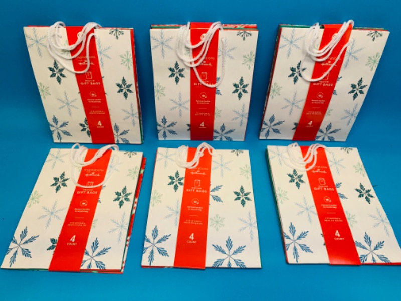 Photo 1 of 625333…24 medium Christmas gift bags-4 different designs 