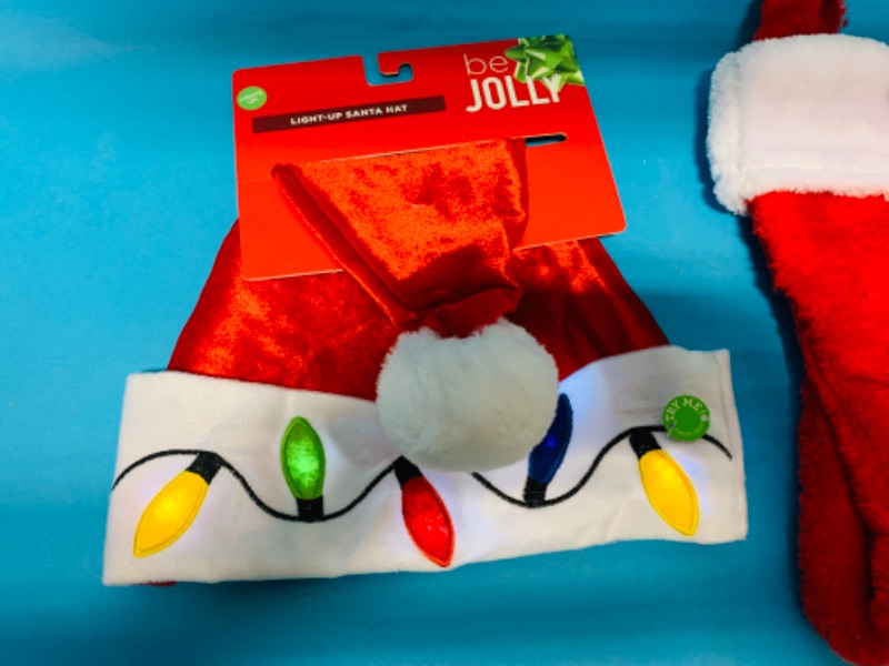 Photo 2 of 625355… plush stocking and light up Santa hat