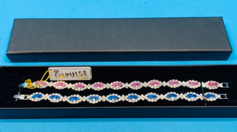 Photo 2 of 625746…  2 Impulse fashion bracelets in gift box