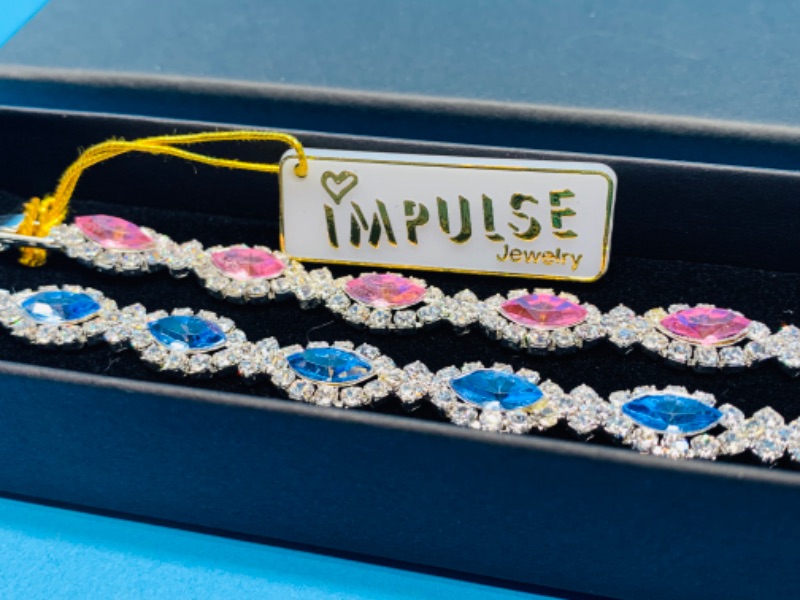 Photo 1 of 625746…  2 Impulse fashion bracelets in gift box