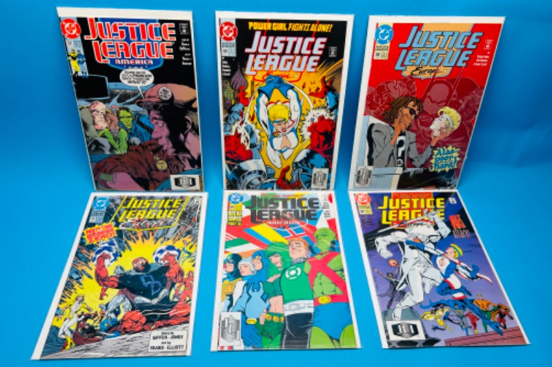 Photo 1 of 625895…6 older justice league comics in plastic sleeves 