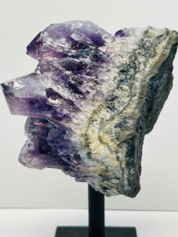 Photo 2 of 626040…4.5”  amethyst crystal rock on stand - height includes display stand 