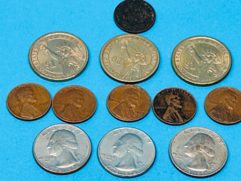 Photo 2 of 626209…circulated- 1905 Indianhead penny, 3 bicentennial quarters , 5 wheat pennies, 3 presidential dollar coins