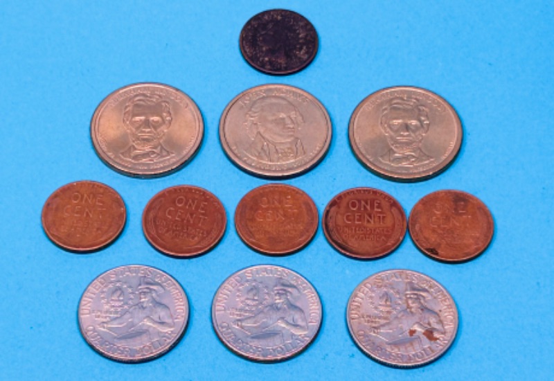 Photo 1 of 626209…circulated- 1905 Indianhead penny, 3 bicentennial quarters , 5 wheat pennies, 3 presidential dollar coins