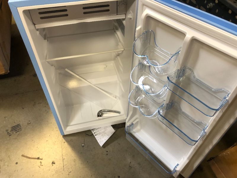 Photo 5 of Frigidaire EFR376-BLUE 3.2 Cu Ft Blue Retro Bar Fridge with Side Bottle Opener
