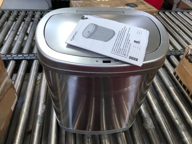 Photo 1 of amazon basics automatic hands free trash can 