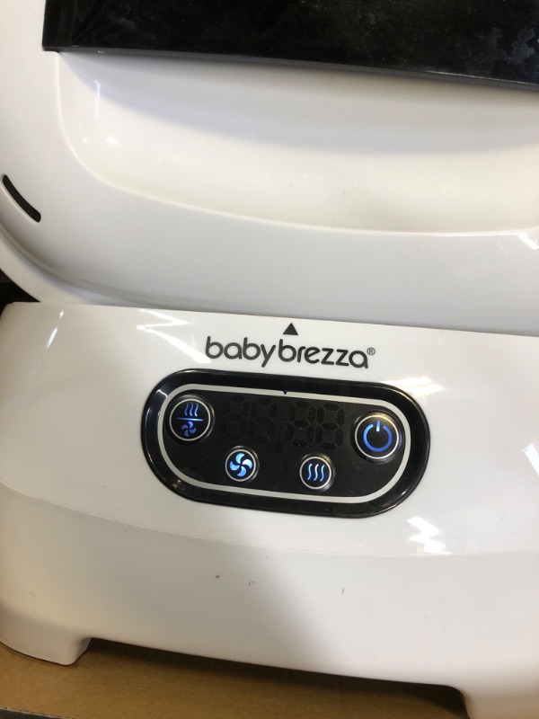 Photo 2 of Baby Brezza Baby Bottle Sterilizer and Dryer Advanced – Electric Steam Sterilization Machine – Universal Sterilizing for All Bottles: Plastic + Glass + Pacifiers + Breast Pump Parts - HEPA Filtration