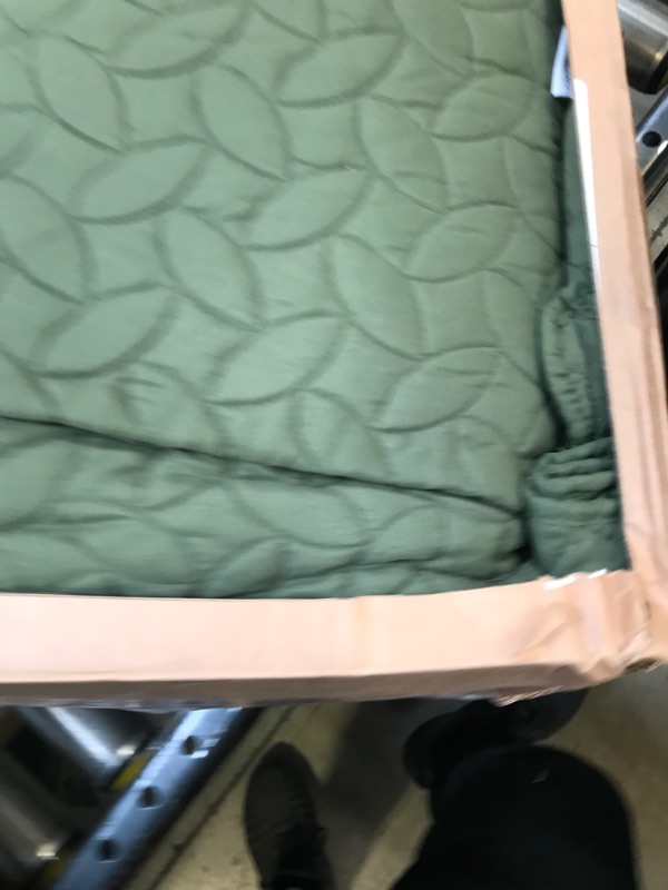 Photo 1 of green throw blanket