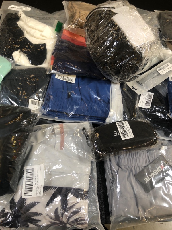 Photo 2 of mystery bag lot filled with different color clothing sizing colors AND quality may vary no returns or exchanges 