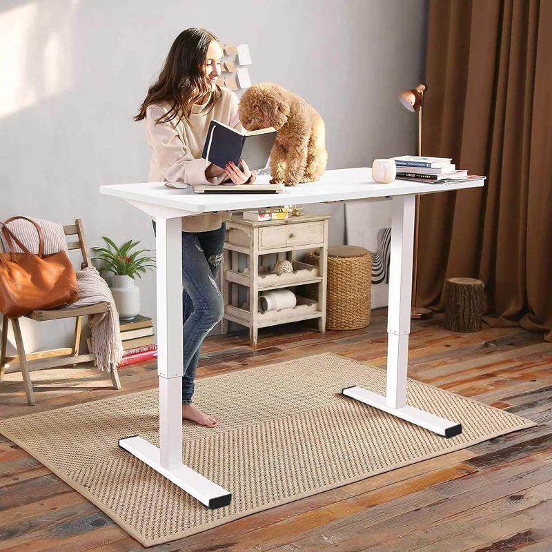 Photo 1 of  White Standing Desk 48 x 24 Inches Height Adjustable Desk, Whole-Piece Desktop Electric Sit Stand Up Desk Home Office Desk (White Desktop + White Frame)