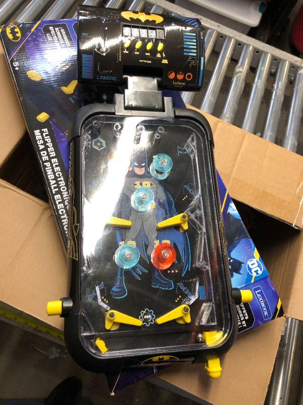 Photo 1 of Lexibook Batman Electronic Pinball Machine, Fun Sounds and Light Effects, 5 Obstacles, Works with 3 LR14 Batteries, Black/Yellow, JG610BAT