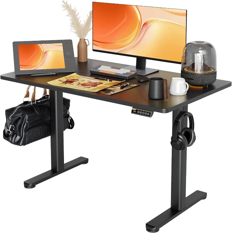 Photo 1 of Claiks Electric Standing Desk, Adjustable Height Stand up Desk, 48x24 Inches Sit Stand Home Office Desk with Splice Board, Black Frame/Black Top
