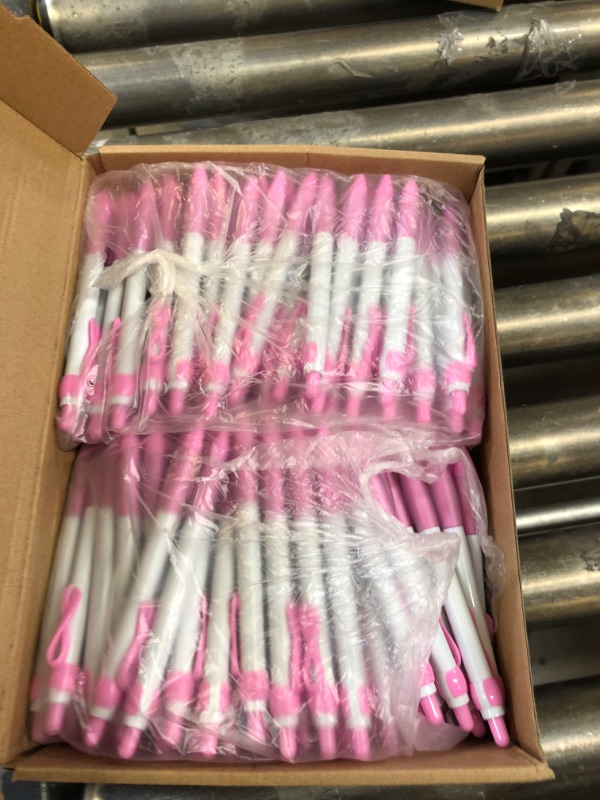 Photo 2 of Henoyso 300 Pcs Breast Cancer Awareness Accessories 100 Pink Ribbon Silicone Bracelets Wristbands 100 Pink Ribbon Pens and 100 Pink Ribbon Pins for Charity Recognition Public Event Fundraiser