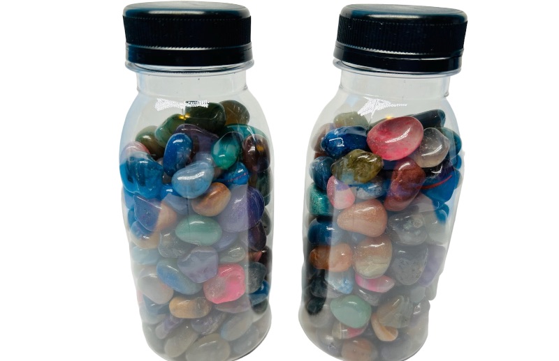 Photo 3 of 662533…. 2 bottles of polished rocks 5” tall 