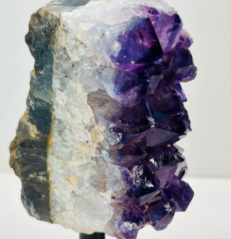 Photo 2 of 662538…two 4” amethyst crystal rocks on stands height includes display stands 