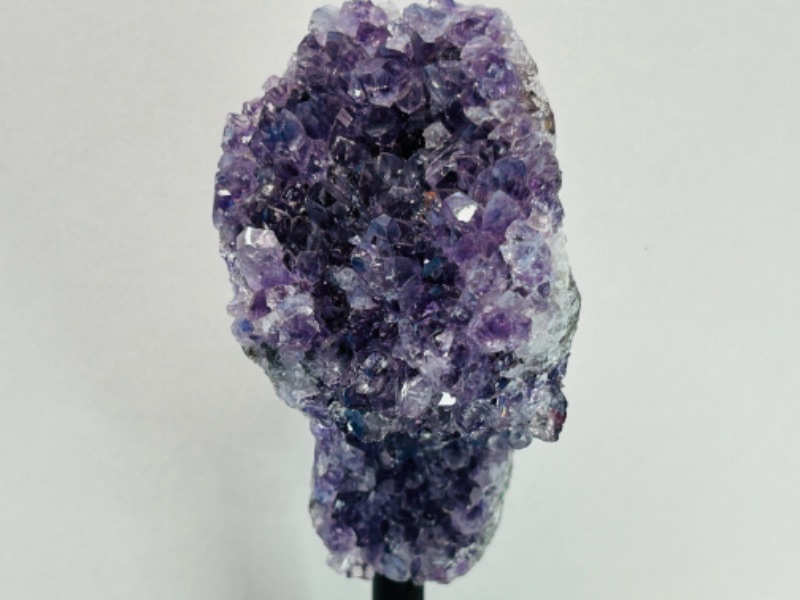 Photo 2 of 662550…5”  amethyst rock on stand - height includes display stand 