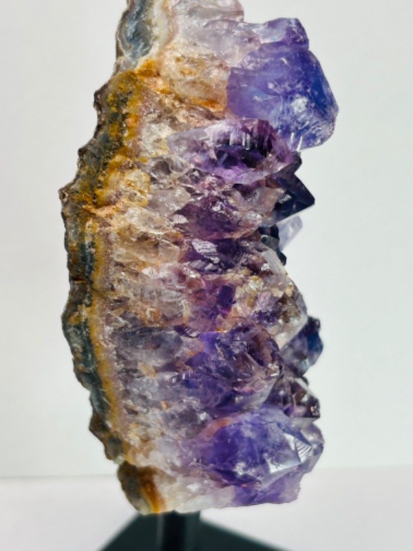 Photo 2 of 662551…5.5”  amethyst rock on stand - height includes display stand 