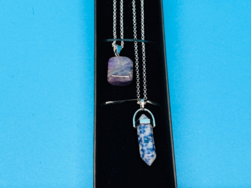 Photo 1 of 662560… 2 polished and crystal cut  rock pendants on chains in gift box 