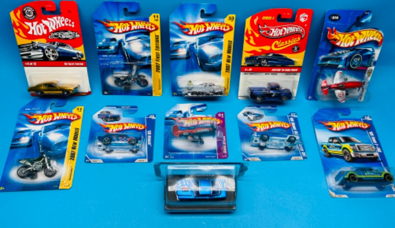 Photo 1 of 662773…damaged packages- hot wheels die cast cars 