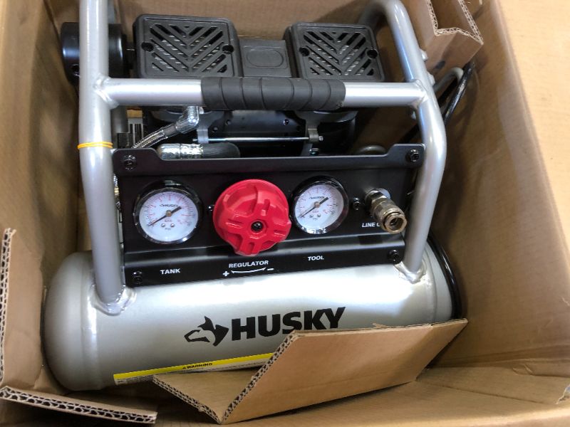 Photo 3 of Husky 1 Gal. Portable Electric-Powered Silent Air Compressor
