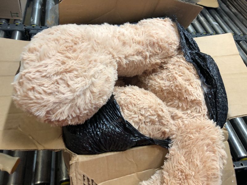 Photo 1 of DOLDOA Big Teddy Bear Stuffed Animals with Footprints Plush Toy for Girlfriend 51 inch (Brown)
