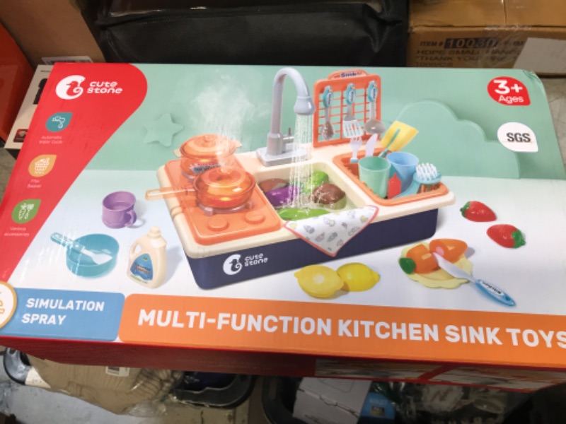 Photo 2 of CUTE STONE Pretend Play Kitchen Sink Toys with Play Cooking Stove, Pot and Pan with Spray Realistic Light and Sound, Dish Rack & Play Cutting Food, Utensils Tableware Accessories for Kids Toddlers