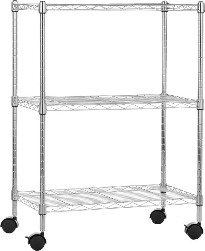 Photo 1 of Amazon Basics 3-Shelf Narrow Adjustable, Heavy Duty Storage Shelving Unit on 2'' PP Plastic Wheel Casters, Metal Organizer Wire Rack, Chrome, 23.2" L x 13.4" W x 32.75" H
