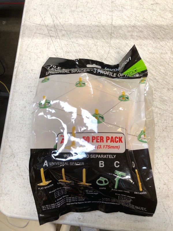 Photo 1 of levolution tile spacer and leveling system 50 pack 1/8in