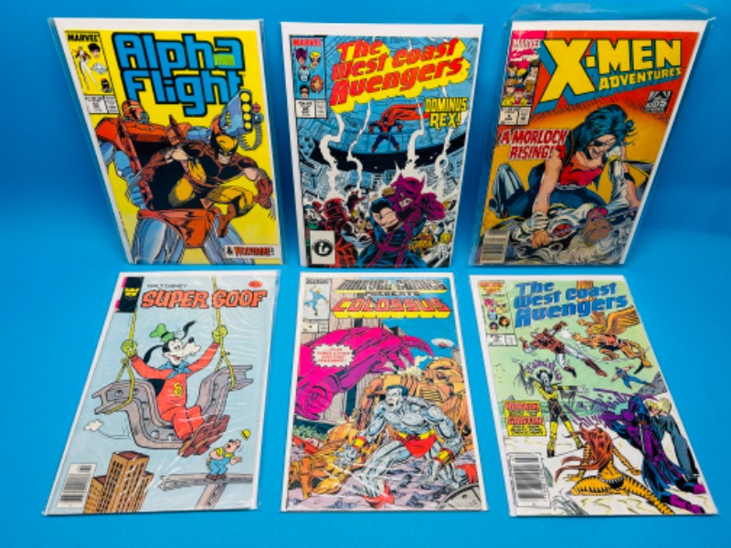 Photo 1 of 685776…6 older  comics in plastic sleeves 