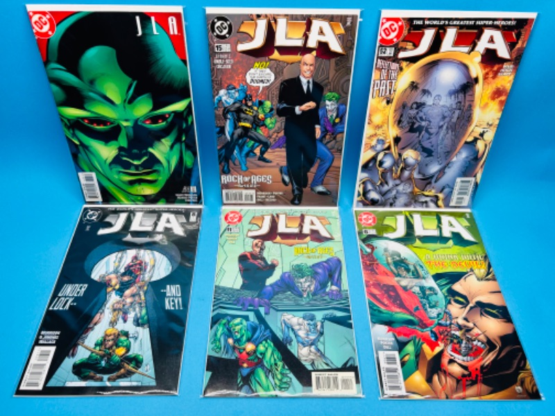 Photo 1 of 686039…6 JLA  comics in plastic sleeves 