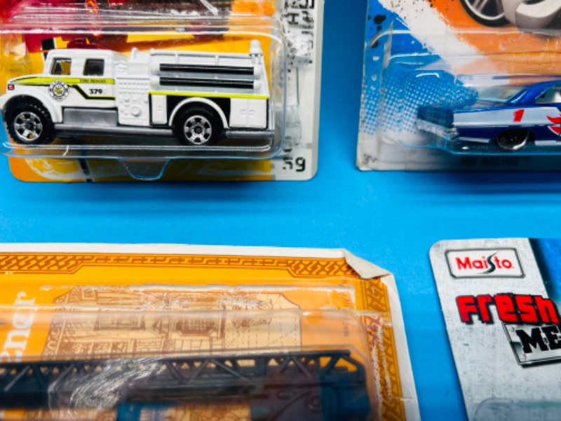 Photo 1 of 686099…damaged packages- die cast cars