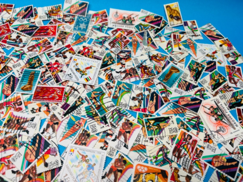 Photo 1 of 686443…hundreds of used Olympic stamps