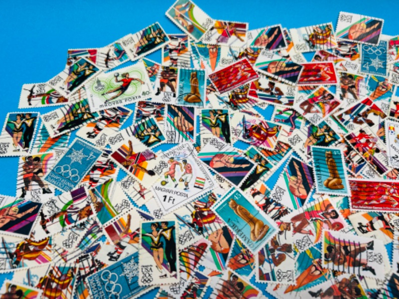 Photo 4 of 686443…hundreds of used Olympic stamps