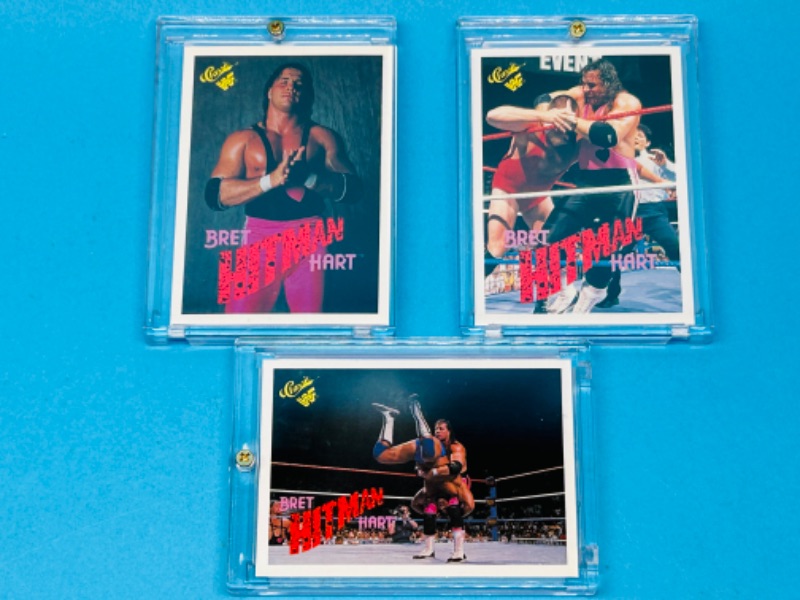 Photo 1 of 686462…3 classic Bret Hitman Heart WWF cards in hard plastic cases