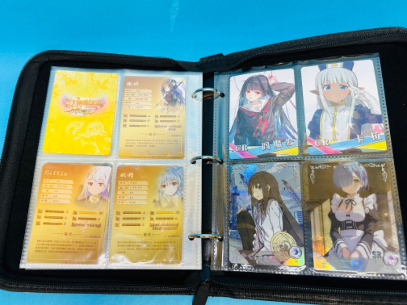 Photo 2 of 686487…68 Asian Anime cards in binder - some holo foil