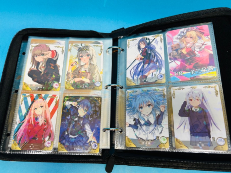 Photo 8 of 686487…68 Asian Anime cards in binder - some holo foil