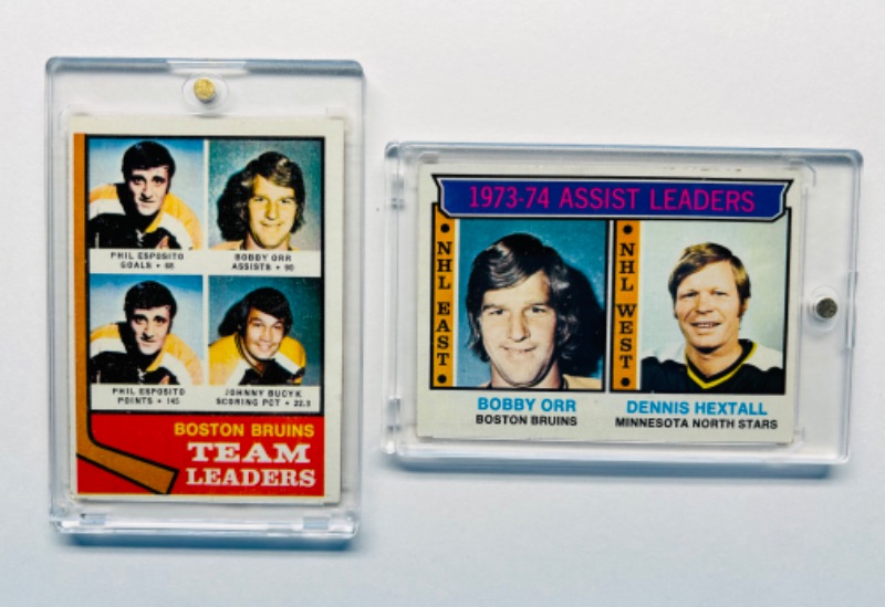 Photo 1 of 686559…1973 vintage hockey cards in hard plastic cases featuring Bobby Orr