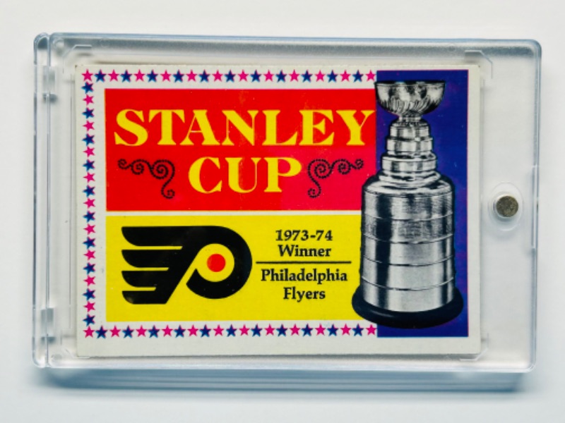 Photo 1 of 686571…1973 Stanley Cup Philadelphia Flyers card 250 and hard plastic case