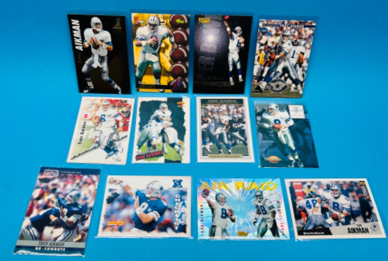 Photo 1 of 686586…12 Troy Aikman trading cards in plastic sleeves