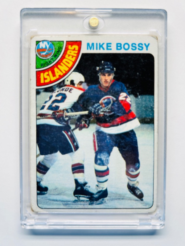 Photo 1 of 686589…1978 rookie Mike Bossy hockey card 115 in hard plastic case 