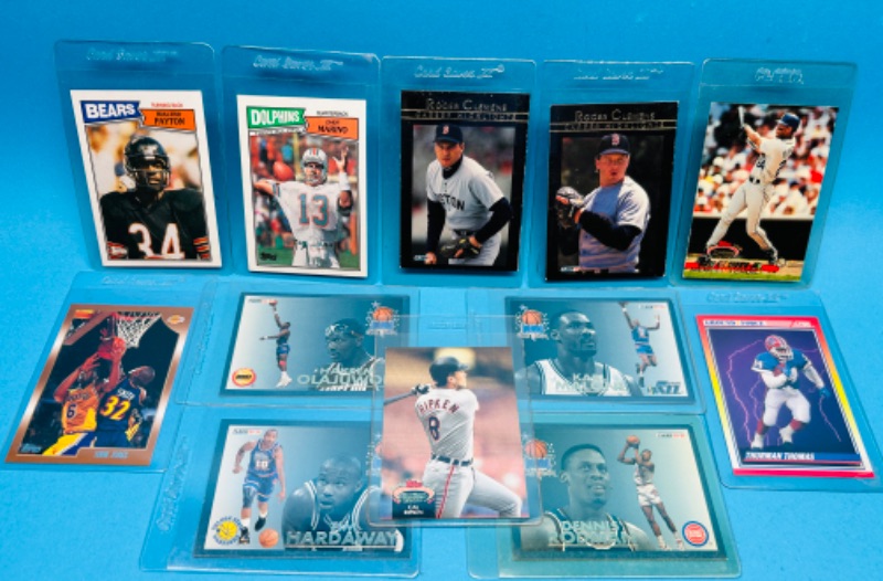 Photo 1 of 686617…12 mixed sports cards in hard plastic sleeves 