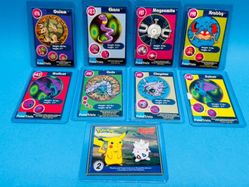 Photo 1 of 686623…9 Pokémon trivia cards in hard plastic sleeves 